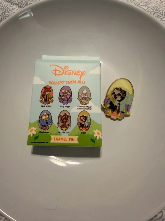This enamel pin features Flash Slothmore from the Disney animated film Zootopia. - Picture 1 of 8